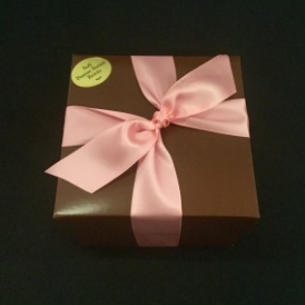 2# Soft Peanut Butter Brittle in a pink and brown box and tied with brown satin ribbon